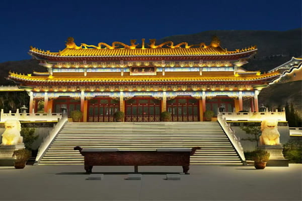 A beautifully lit historic building at night